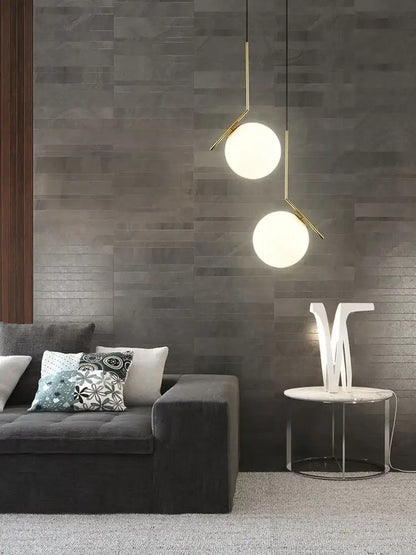 Modern gold glass ball led chandelier light with spherical white glass shades and slender metal arms for decorbites lighting