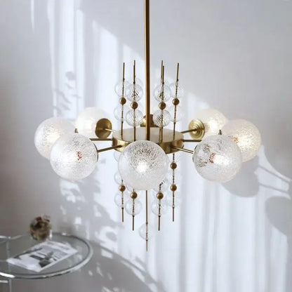 Modern gold glass ball pendant chandelier with frosted glass spheres and clear crystal accents for kitchen island decorbites glass ball