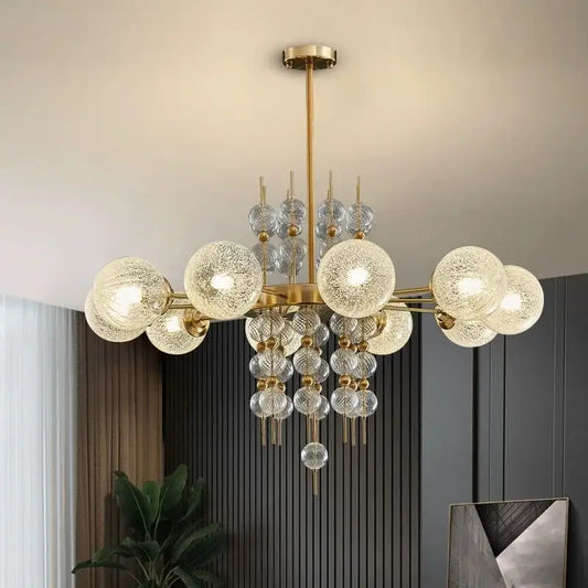 Modern gold glass ball pendant chandelier with clear textured glass spheres and crystal accents for kitchen island decorbites glass ball