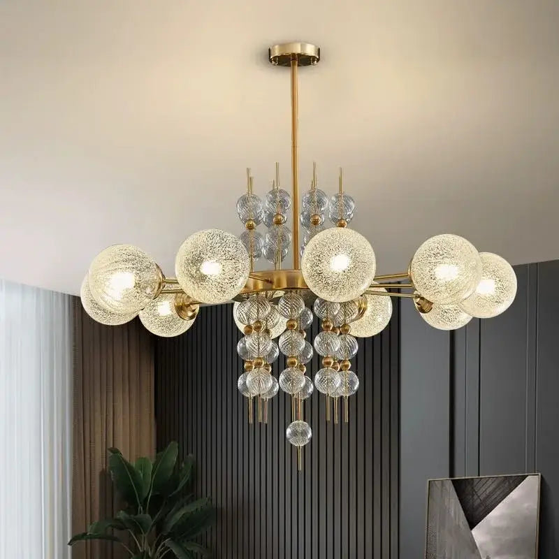 Modern gold glass ball pendant chandelier with clear textured glass spheres and crystal accents for kitchen island decorbites glass ball