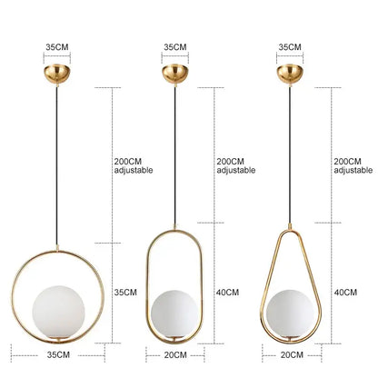 Three modern gold glass ball pendant lights with geometric frosted glass globes for dining room decorbites fixture