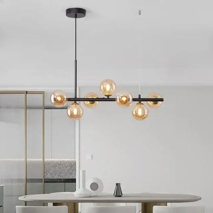 Modern black metal pendant light chandelier with amber glass ball bulbs perfect for dining room decorbites glass ball