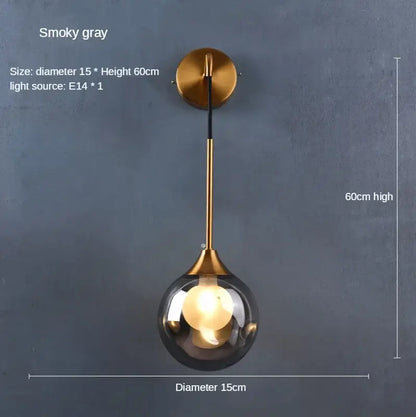 Modern gold glass ball wall sconce with smoked glass globe and brass finish for stylish bedroom decorbites glass ball lighting