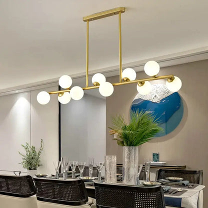Modern gold glass balls chandelier featuring spherical white glass bulbs ideal for dining room decorbites glass balls