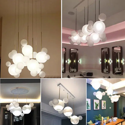 Modern white spherical glass bubble led chandelier with gold-toned metal rods for dining room decorbites glass bubble