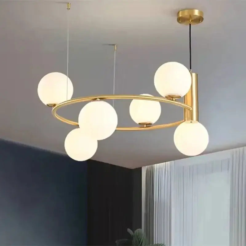 Modern gold glass chandelier g9 hanging light with six frosted globe lights in a circular pattern for living room