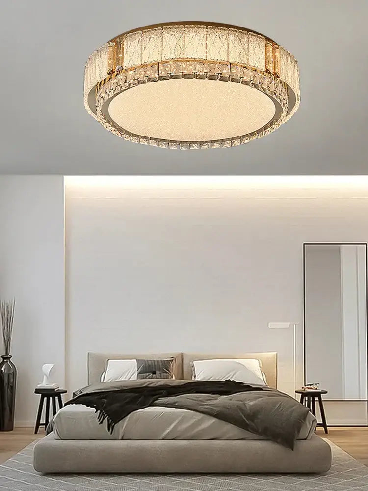 Modern gold glass crystal led ceiling lamp with multi-tiered faceted crystal accents and illuminated central panel