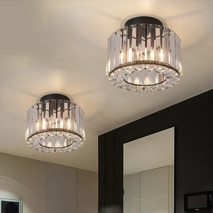 Modern gold glass led chandelier ceiling light with clear glass prisms and black metal base for dining room illumination