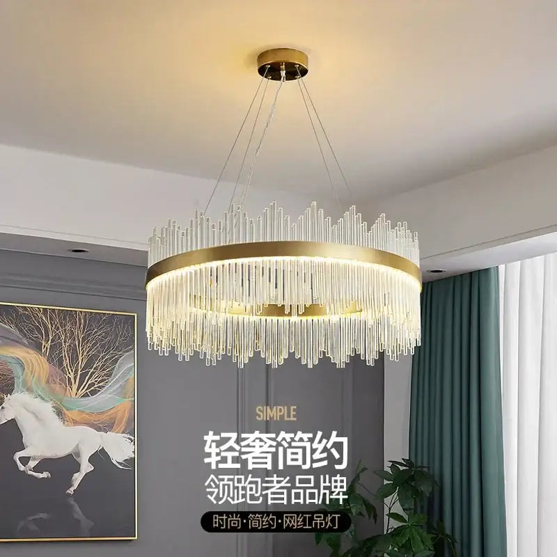 Modern gold pendant chandelier with glass rod led clear crystal rods in a circular design for dining room lighting