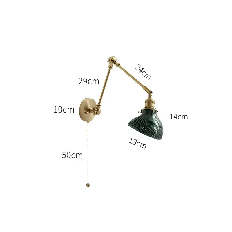 Vintage-style brass wall light with dark green ribbed glass shade and adjustable arm ideal as bedroom led wall light