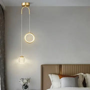 Modern gold pendant lights with glass starry led spherical globe and circular ring design for bedroom lighting