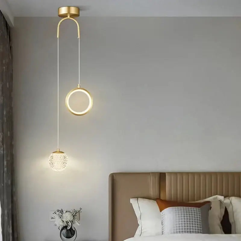 Modern gold pendant lights with glass starry led spherical globe and circular ring design for bedroom lighting