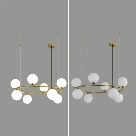 Modern gold pendant light chandelier with circular frame and frosted globe lights for adjustable dining room lighting