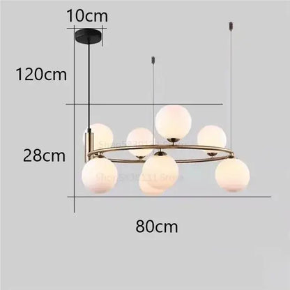 Modern gold brass-toned pendant light chandelier with eight frosted glass globes for adjustable dining room lighting