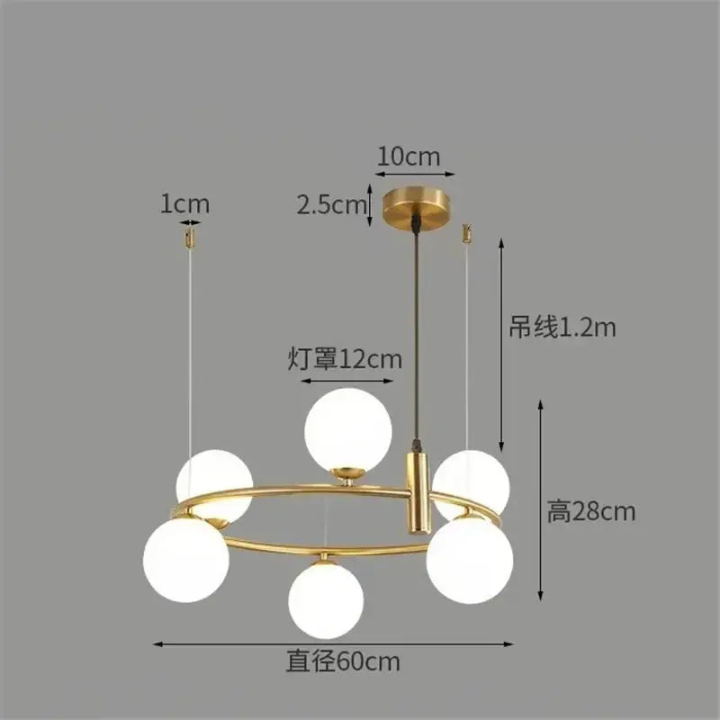 Modern gold-toned pendant light chandelier with six frosted glass globes arranged in a circular pattern for dining room