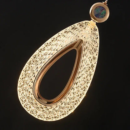 Modern gold heart led chandelier features a gold-toned geometric lattice pendant with an opal stone for decorbites heart led decor