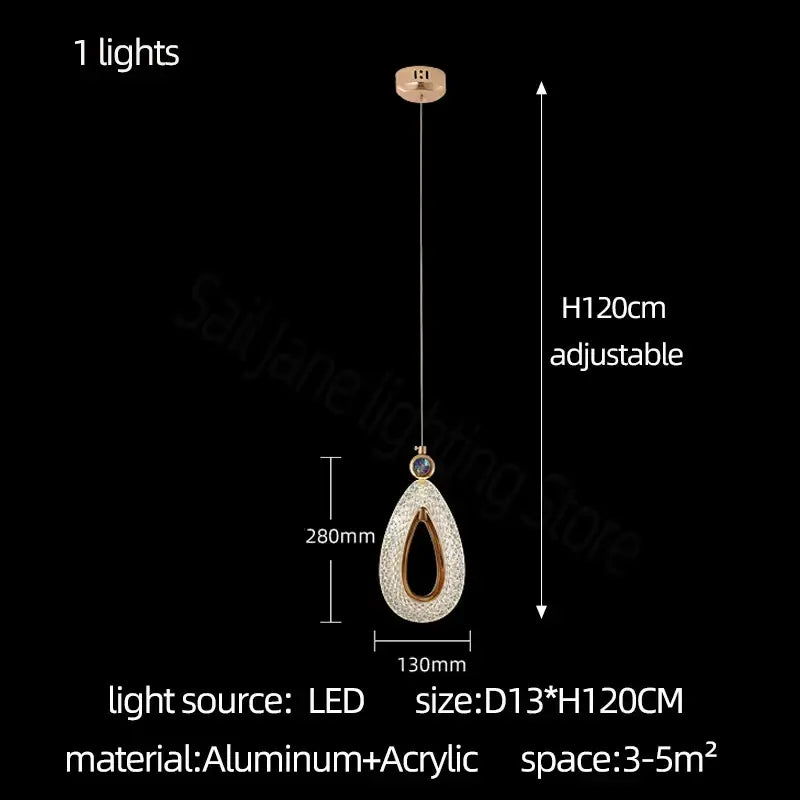 A modern gold heart led chandelier dining room pendant light with a teardrop shape crystal encrusted surface and rose gold accents decorbites heart led