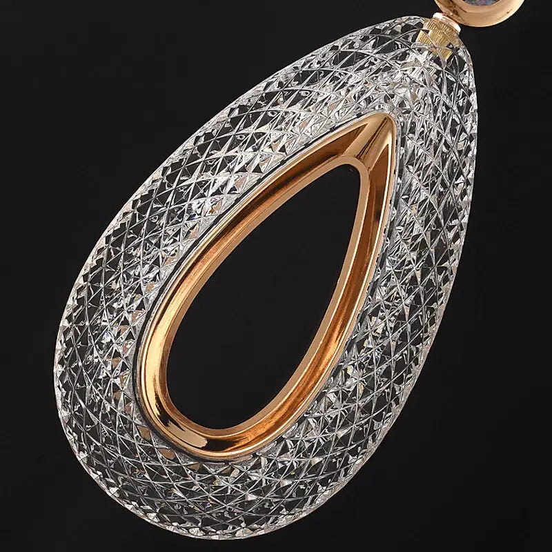 Elegant teardrop-shaped crystal pendant with gold-toned metal frame for modern decorbites heart led chandelier lighting