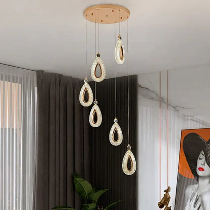 Modern gold heart led chandelier with five teardrop crystal lights from decorbites heart led pendant collection