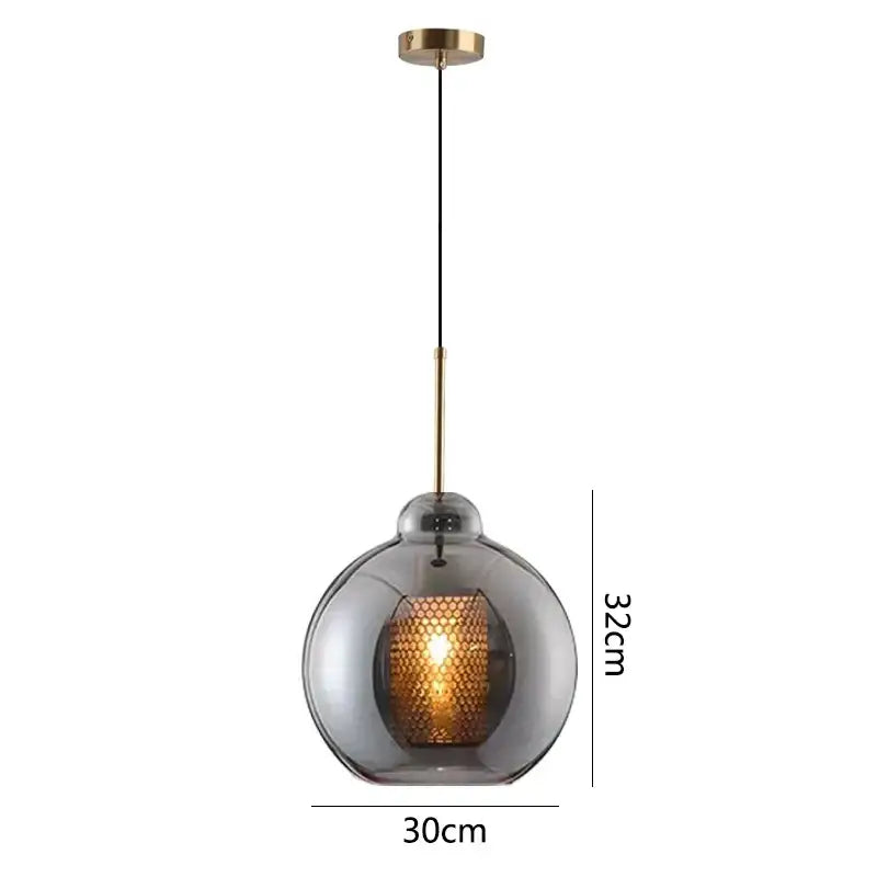 Modern gold honeycomb glass pendant lights featuring a spherical smoked glass pendant light with brass finish for dining rooms