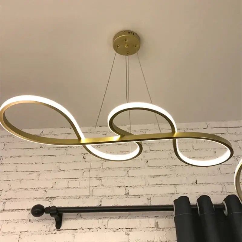 Gold-finished modern infinity loop led pendant lights by decorbites elegant pendant for stylish dining room decor