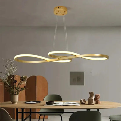 Modern gold infinity led elegant pendant lights with sleek design hanging above dining table for pendant lights decorbites elegant pendant