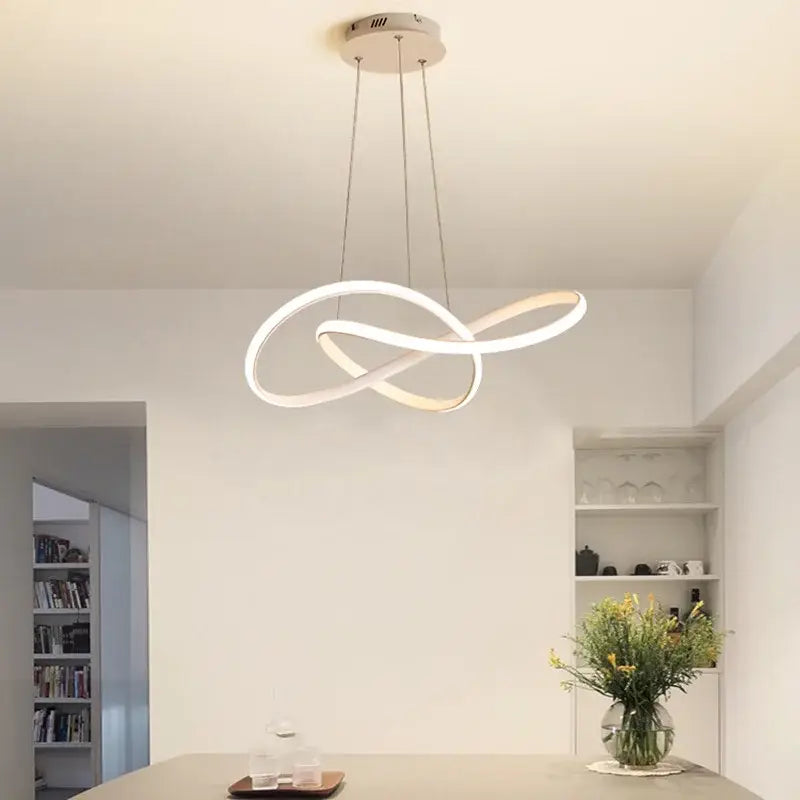 Modern gold infinity loop cord pendant light with sleek white led intertwined circular design for dining room