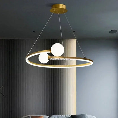 Modern gold iron led chandelier light with two glowing white spherical bulbs suspended by thin cords for living room decorbites iron led