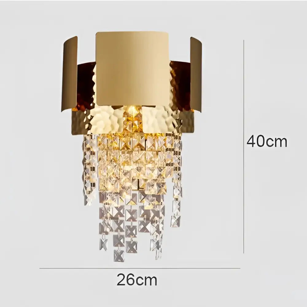 Modern gold wall lamp with hammered metal frame and cascading clear crystal prisms for decorbites crystal wall lighting