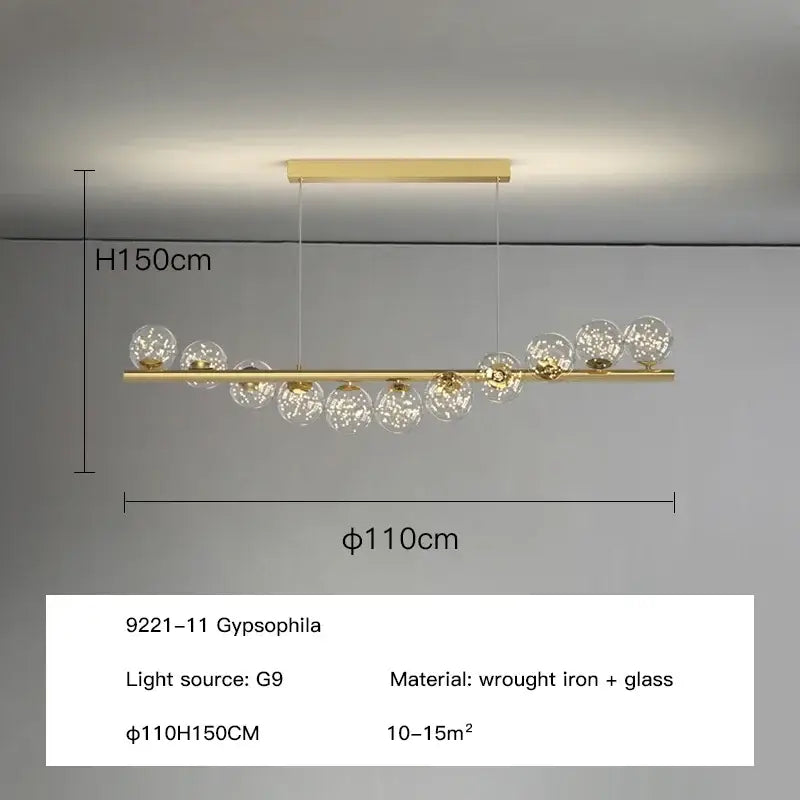 Modern gold led ceiling chandeliers featuring clear glass globe shades and a sleek wrought iron bar for dining rooms