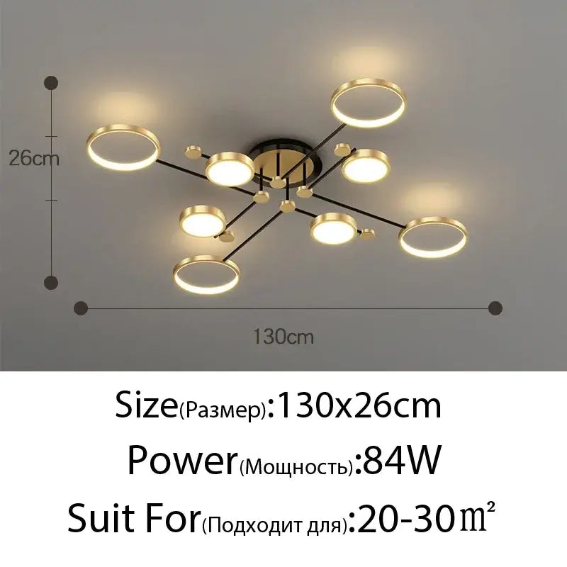 Modern gold led ceiling lamp with circular pendant, black arms, and spherical accents for living room lighting