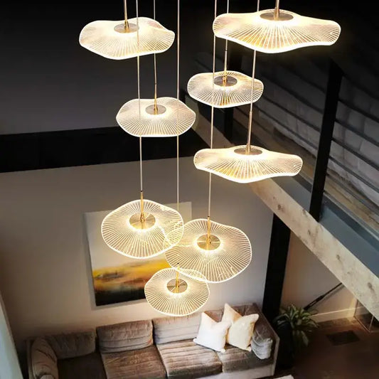 A modern gold led lotus chandelier with tiered fan-shaped light fixtures for staircase and dining room decorbites gold led