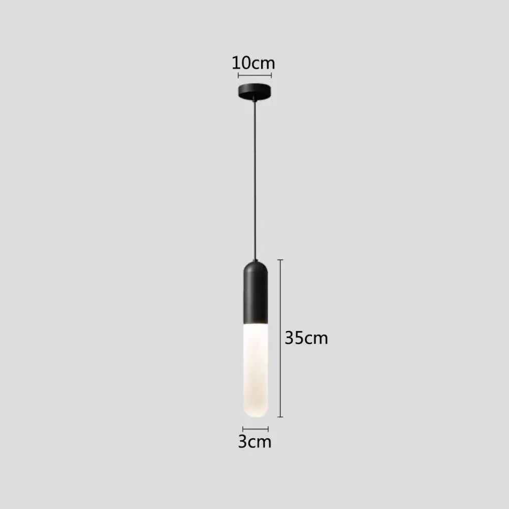Modern gold led pendant lamp featuring black and frosted glass with sleek cylindrical design for bedroom and kitchen lighting decorbites gold led