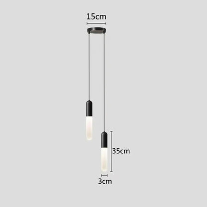 Minimalist black and frosted glass decorbites gold led pendant lamp with sleek cylindrical design for bedroom and kitchen lighting