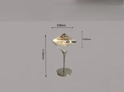 A sleek modern decorbites gold led pendant lamp with metallic finish and textured abstract mountain-shaped shade for dining room