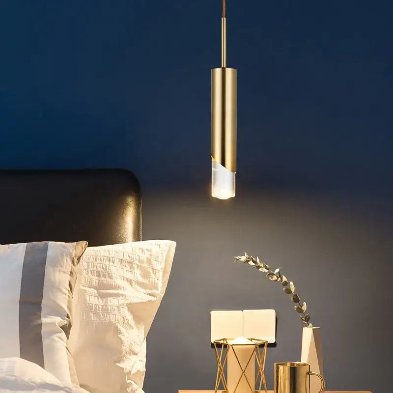 Modern gold led pendant light with a brushed gold finish and frosted glass diffuser for dining room decorbites gold led
