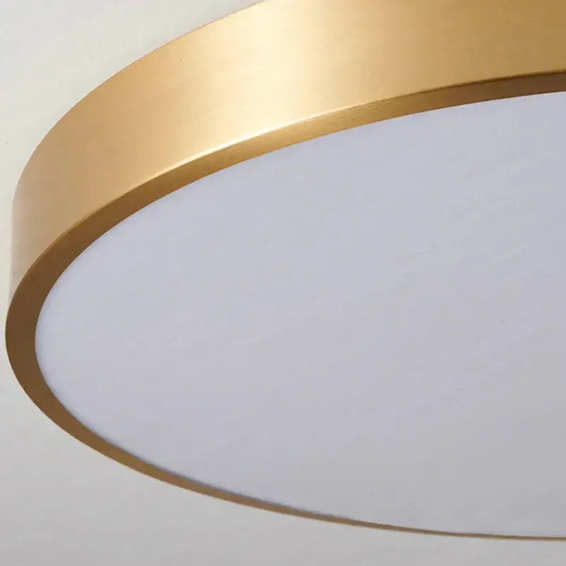 Modern gold led round ceiling light with a sleek metallic frame and soft white diffused lighting for bedroom use