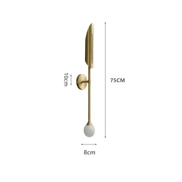 Modern gold led single wall lamp with sleek blade-shaped element and round white glass globe for bedroom decorbites gold led