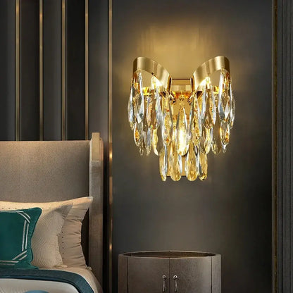 Modern gold led sunflower crystal ceiling chandelier with gold-toned crystal sconce and cascading teardrop crystals