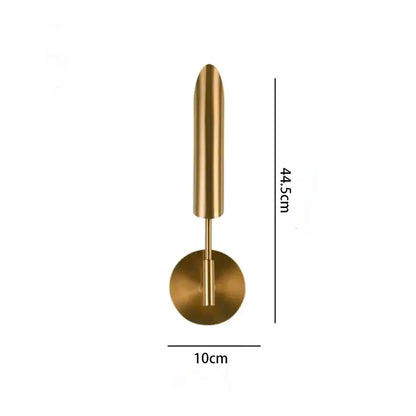 Brass-finished modern wall lamp with elongated cylindrical shade and spherical bulb for living room led wall lighting