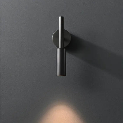 Minimalist black matte led wall lamp with cylindrical design and adjustable color temperature for modern bedroom lighting