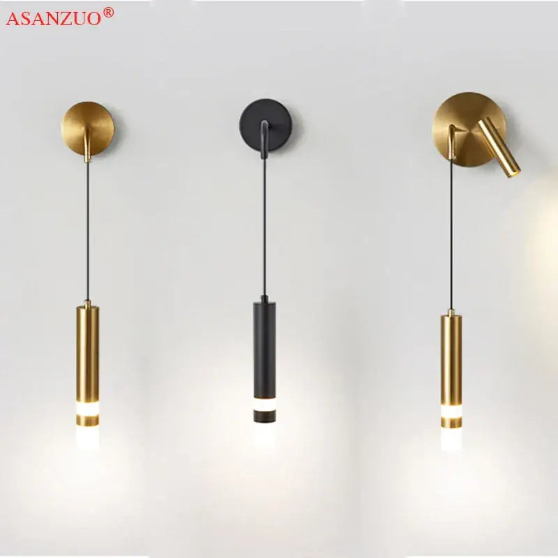Modern gold led wall lamps featuring minimalist brushed brass and matte black cylindrical fixtures suspended by cords for decorbites led wall lighting