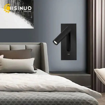 Black modern wall sconce with adjustable head and sleek rectangular base ideal for bedroom reading decorbites led wall lighting