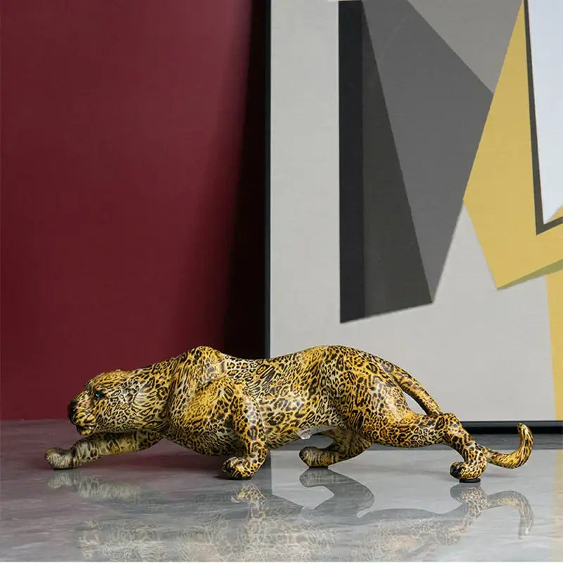 Modern gold leopard resin statue with detailed spotted pattern and sleek lifelike pose for living room wildlife decorbites leopard resin
