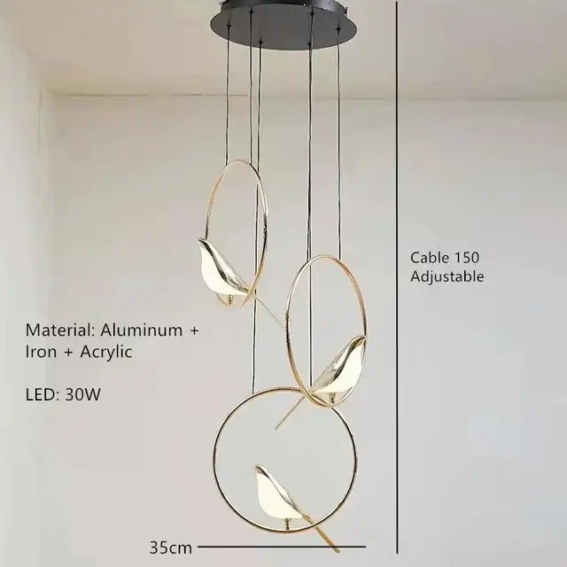 Modern gold magpie bird led ring chandelier featuring three gold-toned circular frames with bird-shaped lamps for dining room decor