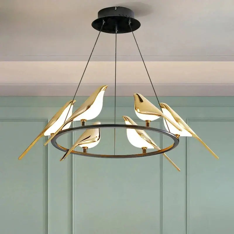 Modern gold magpie bird led ring chandelier featuring a sleek gold tone with frosted glass accents for dining room decorbites gold magpie