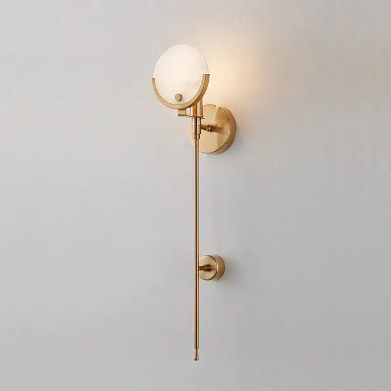 Modern gold marble wall light with gold-toned sconce and frosted glass globe for bedroom and living room decorbites decor