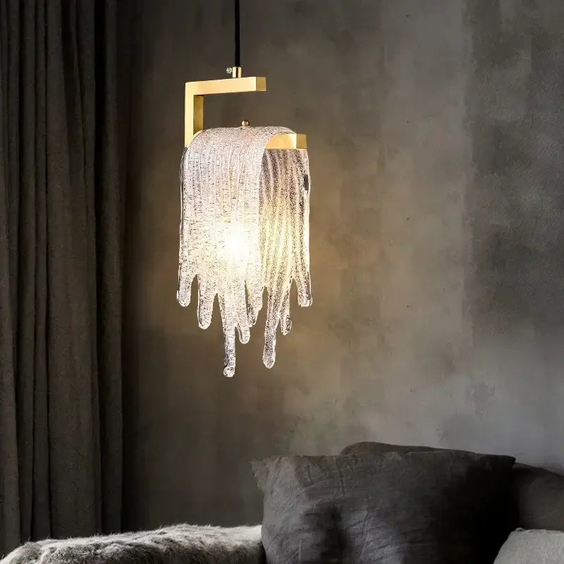 A modern gold melting ice crystal led pendant light with textured glass strands for warm bedroom decorbites crystal led decor