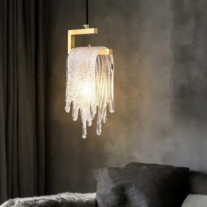 A modern gold melting ice crystal led pendant light with textured glass strands for warm bedroom decorbites crystal led decor