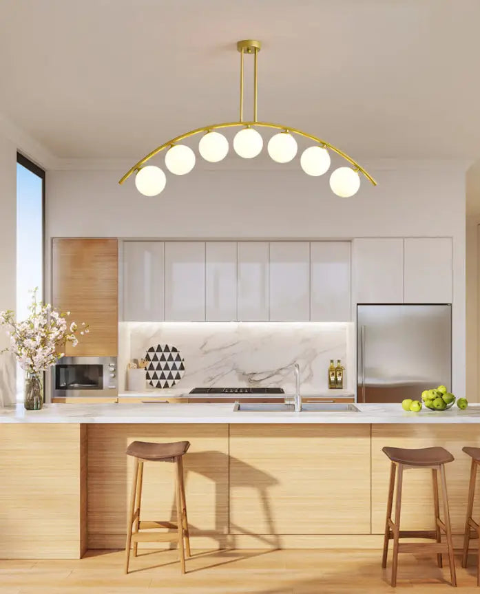Modern gold metal arched ceiling light with six frosted glass bulbs for dining room illumination